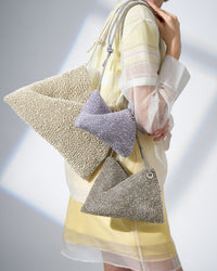 SS25_Main_2_TWIST_BAG_MINI_PB25FP63K9_LAVANDAGENTO_TWIST_BAG_SMALL_PB23SP64F5_KHAKIGENTO_TWIST_BAG_LARGE_PB23FP65B1_LATTE_OPACO_4a440a3b-c202-4d97-b3b1-ae34ba7836c0